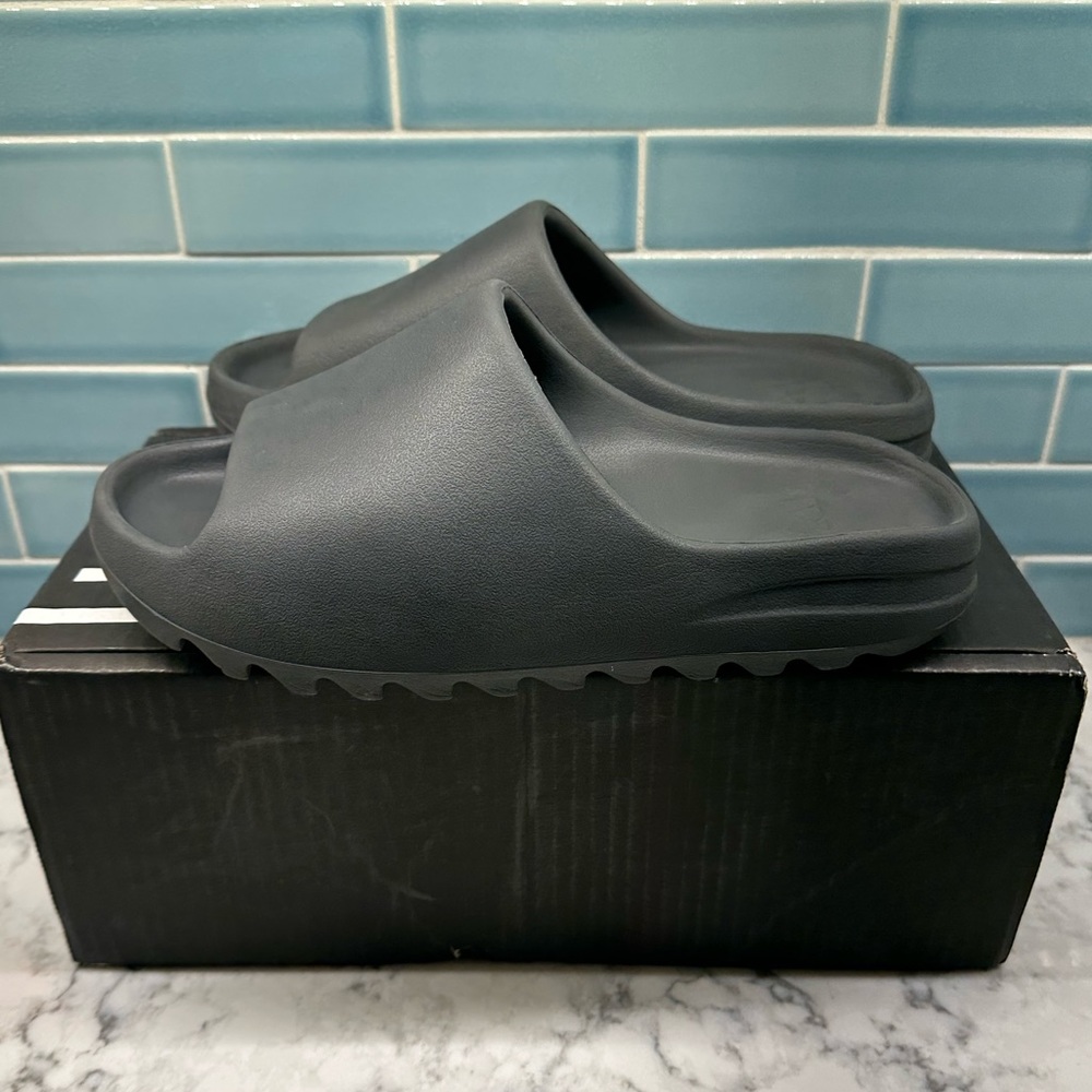 Onyx Yeezy Slides men’s size 10.  Gently worn, good condition.  No Yeezy box.